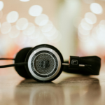 Pair of headphones with beautiful soft focus lights in the background