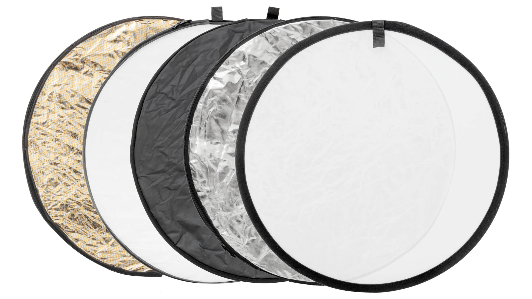 A set of different coloured circular collapsible reflectors.